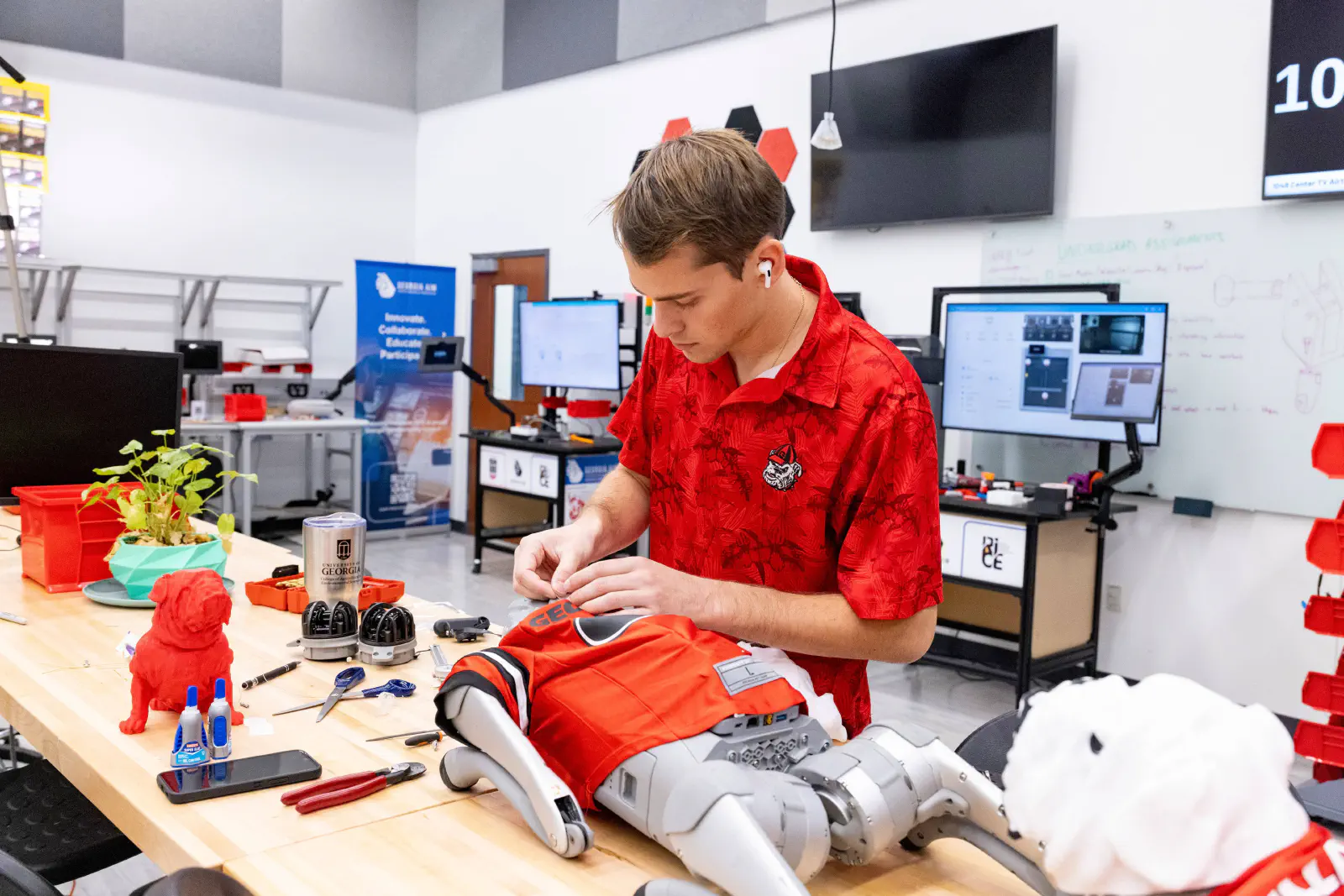 A student working on a robot dog